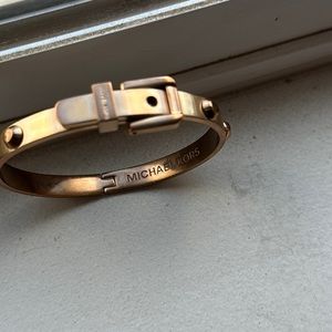 MK buckle style rosegold bracelet.
